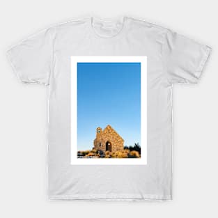 Sun sets on stone front of Church of Good Sheppard in Tekapo. T-Shirt